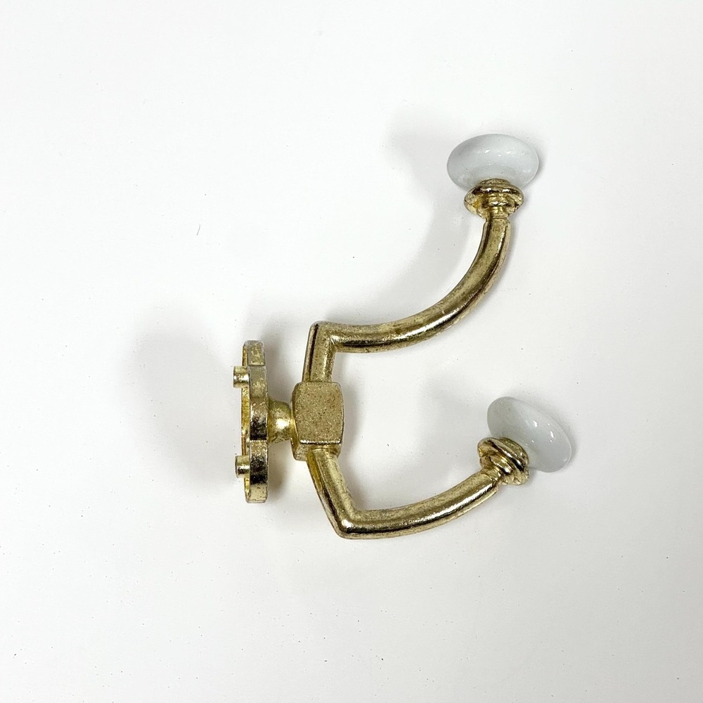 Vintage brass and porcelain double wall hook